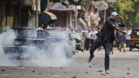 Un partisan de Mohamed Morsi dans les rues du Caire, mardi 13 août 2013.