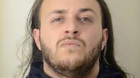 Badiss Mohamed Amide Bajjou, un Franco-Marocain de 24 ans arrêté au Maroc, soupçonné d'avoir commandité une série d'enlèvements visant des entrepreneurs du secteur des cryptomonnaies en France - photographie obtenue le 4 juin 2025 par Interpol