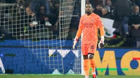 Mike Maignan le 20 janvier 2024 lors du match de championnat entre l'Udinese et le Milan AC dans le stade de l'Udinese
