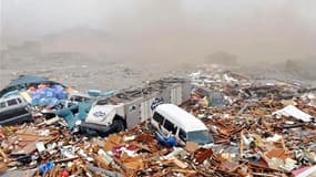 Kesennuma, dans l'archipel nippon. Le séisme et le tsunami qui ont dévasté vendredi la côte nord-est du Japon ont fait au moins 44 morts et de nombreux disparus. /Photo prise le 11 mars 2011/REUTERS/YOMIURI