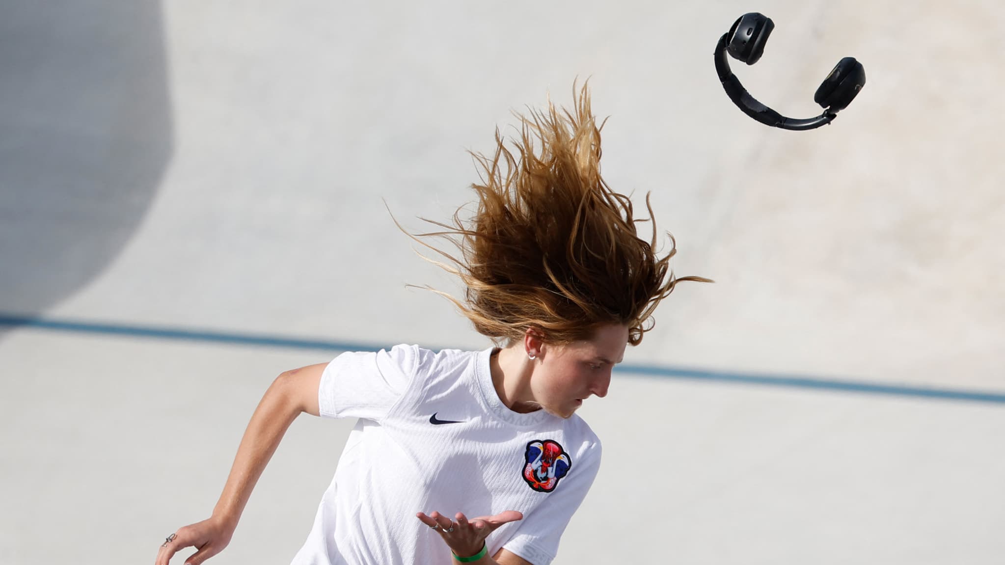 Poe Pinson perd son casque pendant l'épreuve de street skate, le 28 juillet 2024