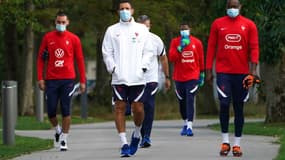 Steve Mandanda à droite, Hugo Lloris à gauche, et Mike Maignan en arrière plan