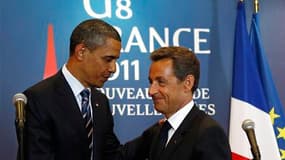 A l'issue d'un entretien en marge du sommet du G8 à Deauville, Barack Obama et Nicolas Sarkozy ont affirmé que les Etats-Unis et la France étaient déterminés à "finir le travail" en Libye. /Photo d'archives/REUTERS/Kevin Lamarque