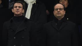 Manuel Valls et François Hollande au Stade de France, le 19 mars.