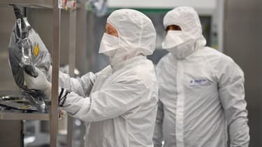 Technicians work on the newly named Rosalind Franklin ExoMars rover at the Airbus Defence and Space facility in Stevenage, north of London on February 7, 2019
