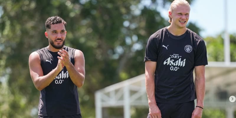 Rayan Cherki et Erling Haaland