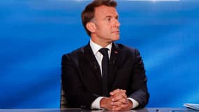 Le président français Emmanuel Macron lors de sa participation à une émission spéciale de TF1 à Saint-Denis, le 13 mai 2025.