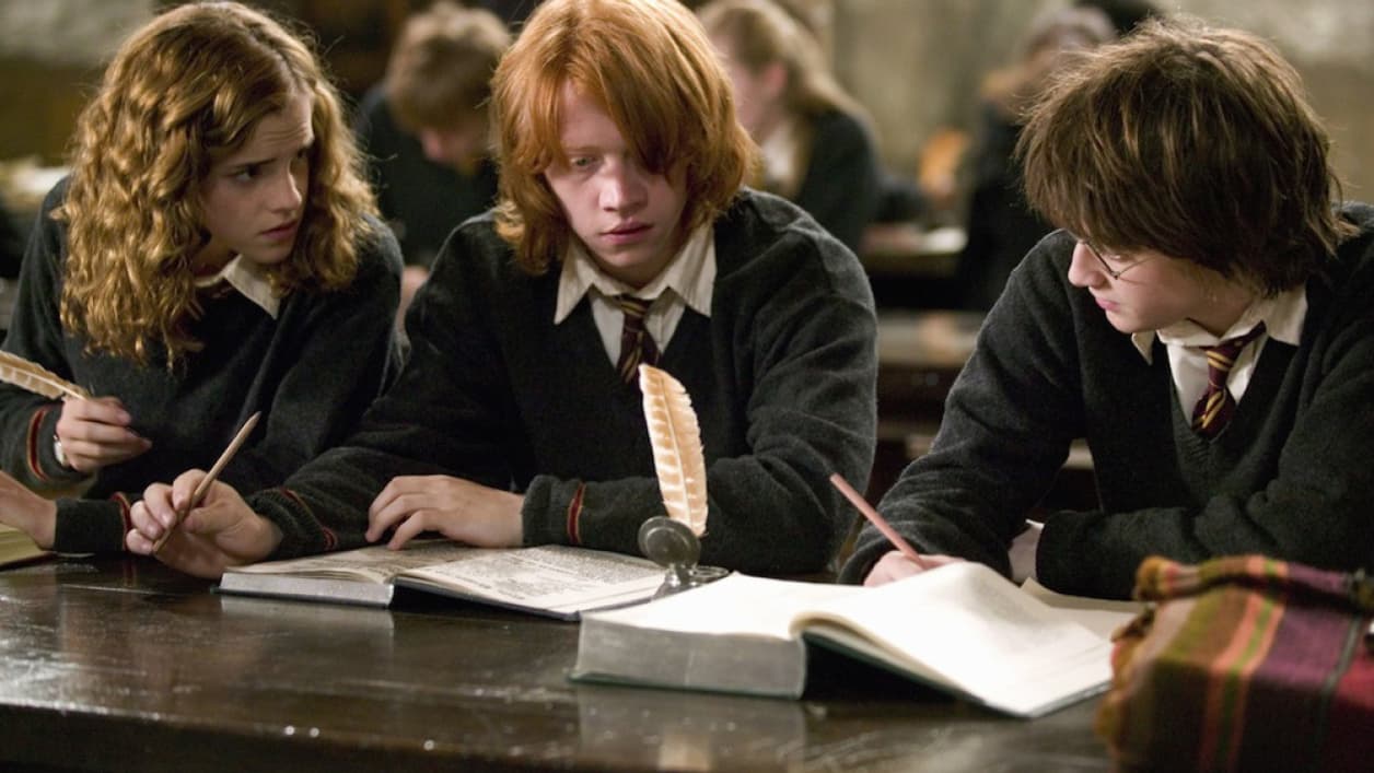 Hermione, Ron et Harry dans la saga de films "Harry Potter" Hermione, Ron et Harry dans la saga de films "Harry Potter"