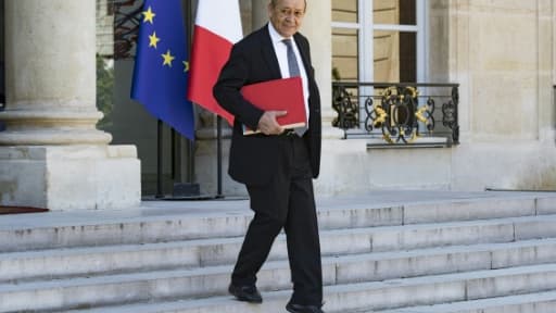Le ministre des Affaires étrangères Jean-Yves Le Drianquitte l'Elysée, le 3 août 2018 à Paris