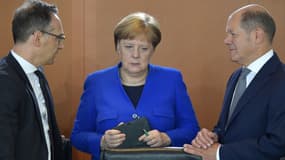 La chancelière allemande Angela Merkel avec son ministre des Affaires étrangères Heiko Maas et son vice-chancelier Olaf Scholz, avant le conseil des ministres à Berlin, mardi 15 mai 2019 .