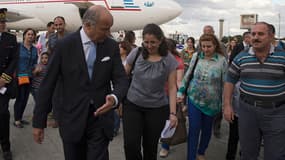 Laurent Fabius a accueilli une quarantaine de chrétiens réfugiés d'Irak jeudi soir à Roissy.