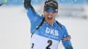 La joie du Français Quentin Fillon-Maillet, vainqueur de la poursuite, comptant pour la Coupe du monde de biathlon, le 12 décembre 2020 à Hochfilzen (Autriche)
