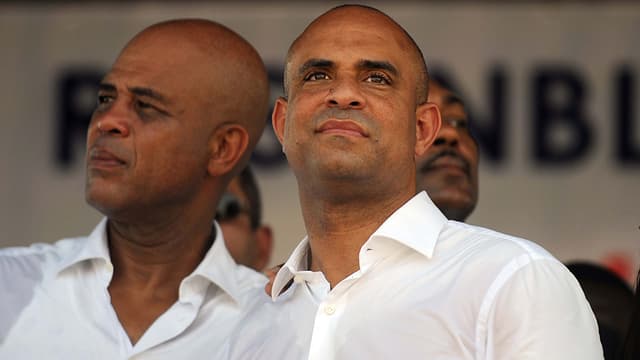 Le Premier ministre Laurent Lamothe (au premier plan) et le président haitien Michel Martelli, le 17 octobre, Port-au-Prince.
