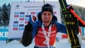 La joie du Français Quentin Fillon-Maillet, vainqueur de la poursuite, comptant pour la Coupe du monde de biathlon, le 18 décembre 2021 au Grand Bornand