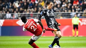 Maxence Caqueret face à Reims, le 20 mars 2022.