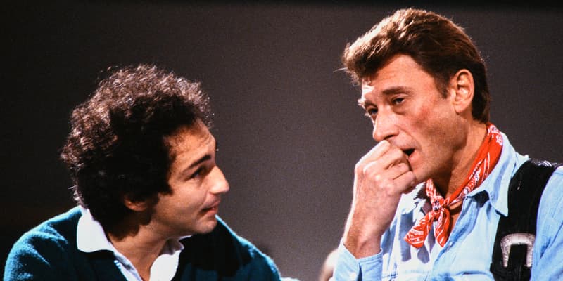 Michel Berger et Johnny Hallyday sur le plateau de l'émission "Le grand échiquier" le 3 novembre 1985.