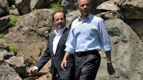 Francois Hollande, ici en compagnie de Barack Obama à Camp David, a exprimé samedi à l'issue du G8 sa volonté de voir la Grèce rester dans la zone euro et respecter ses engagements tout en étant accompagnée dans sa croissance. Une intention qui figure dan