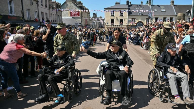 Des vétérans américains dans les rues de Sainte-Mer-Eglise, le 5 juin 2024 dans la Manche Des vétérans américains dans les rues de Sainte-Mer-Eglise, le 5 juin 2024 dans la Manche