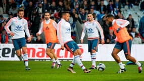 Les joueurs de l'OL à l'échauffement 