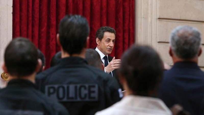 A l'Elysée, Nicolas Sarkozy, qui recevait tous les services ayant participé à la traque de Mohamed Merah, a annoncé mardi de nouvelles mesures de sécurité contre les dérives extrémistes et les risques de terrorisme en France. /Photo prise le 27 mars 2012/
