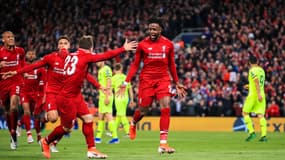 Divock Origi (à droite) célébrant le quatrième but contre Barcelone en demi-finale retour de la Ligue des champions le 7 mai 2019. 