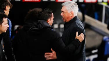 Xavi et Carlo Ancelotti