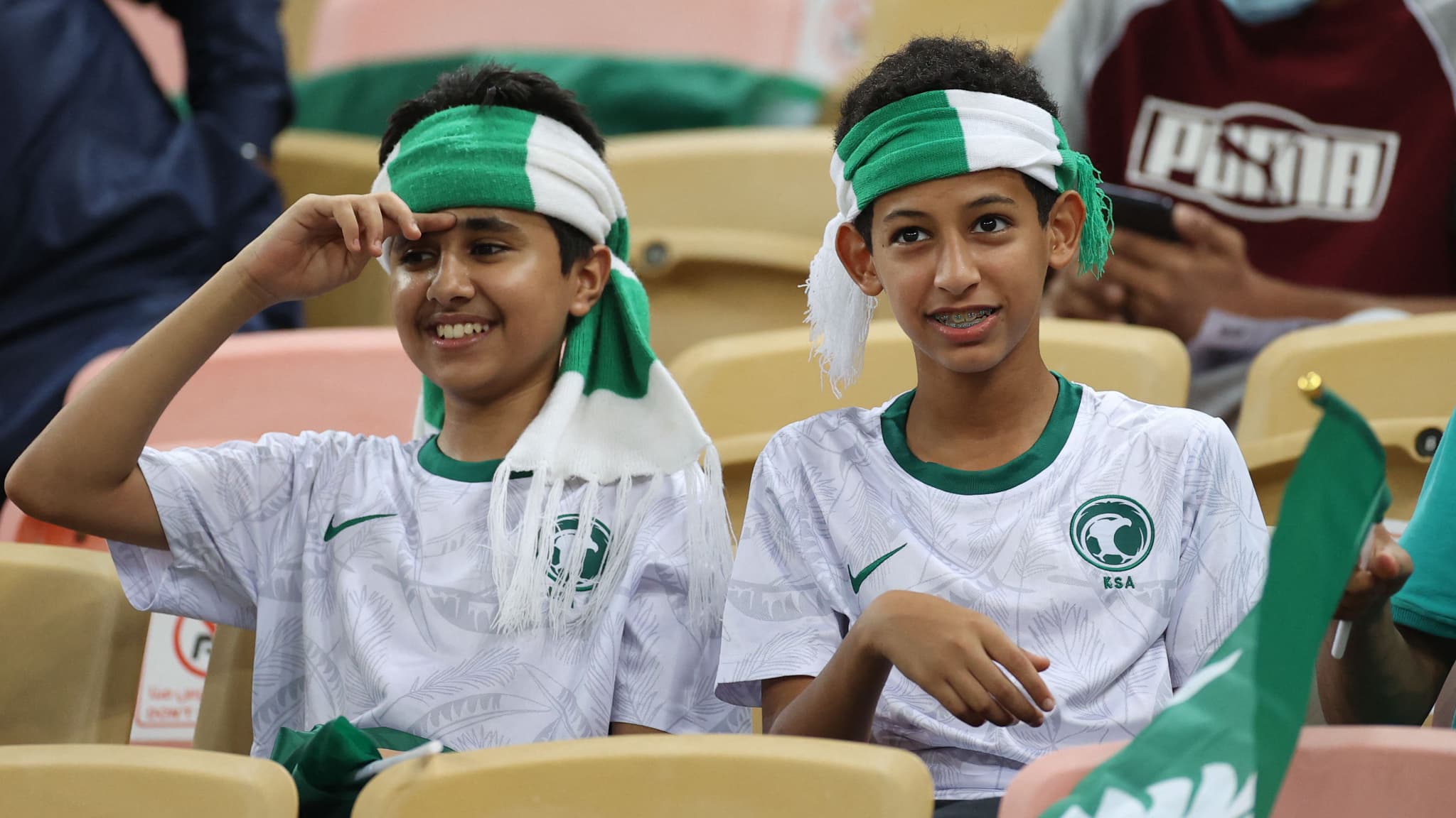 Des supporters saoudiens lors d'un match qualificatif pour le Mondial 2022 Des supporters saoudiens lors d'un match qualificatif pour le Mondial 2022