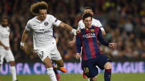David Luiz face à Lionel Messi en 2015, en quarts de finale de la Ligue des champions entre le PSG et le Barça.
