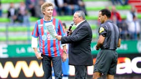 Denis Brogniart avec le maillot du SM Caen lors d'un match de Ligue 1 contre l'OL - le 21/09/2011