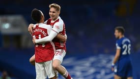 La joie du milieu de terrain d'Arsenal, Emile Smith-Rowe, après avoir ouvert le score face à Chelsea, lors de leur match de Premier League, le 12 mai 2021 à Stamford Bridge à Londres