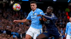 L'Espagnol Rodri au duel avec le Français Ferland Mendy lors du quart de Ligue des champions Manchester City-Real Madrid, le 17 avril 2024