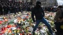 Les hommages aux victimes des attentats de Bruxelles ont été perturbés dimanche par des manifestants nationalistes