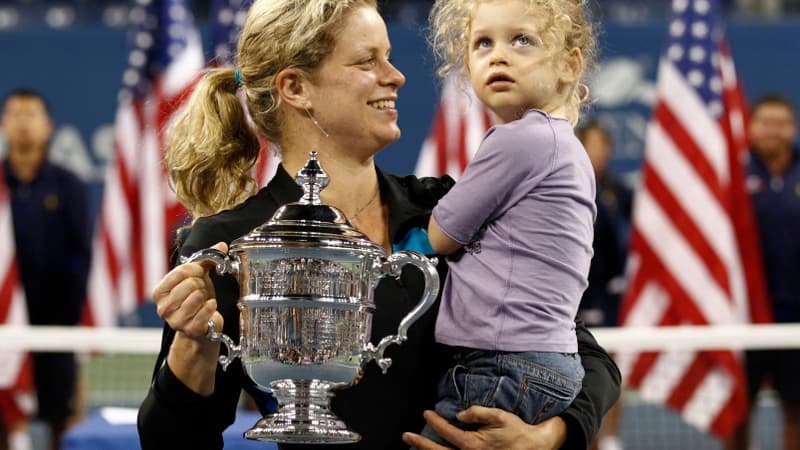 Avec sa petite fille, la Belge savoure doublement sa victoire...