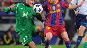 Lionel Messi (à droite) au duel