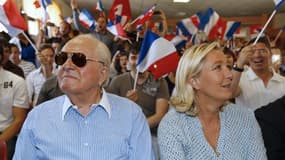 Marine Le Pen (droite) et Jean-Marie Le Pen à Fréjus le 7 septembre 2014