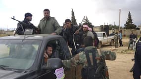 Combattants syriens à Koussaïr, le mois dernier. Les rebelles syriens encerclés à Koussaïr par les forces gouvernementales et des combattants du Hezbollah ont réclamé jeudi une aide militaire et médicale, tandis que Bachar al Assad annonçait avoir pris li
