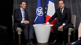 François Hollande, ici avec le secréataire général de l'OTAN Anders Fogh Rasmussen. Le président français s'est prononcé dimanche pour une approche "pragmatique", sous conditions, de la question de la création d'un bouclier antimissile appelée à être abor