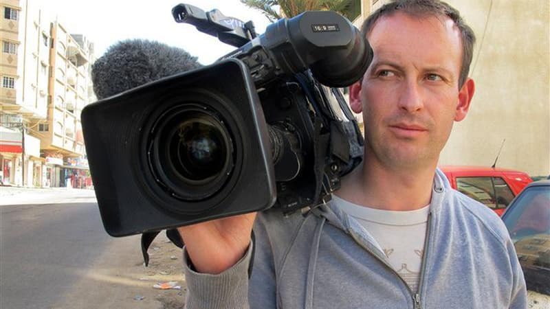 Gilles Jacquier, le journaliste français tué à Homs, en Syrie, le 11 janvier, aurait été victime d'une bavure des insurgés syriens, selon Le Figaro, qui précise tenir l'information d'un responsable de la Ligue arabe. /Photo d'archives/REUTERS/France Télév