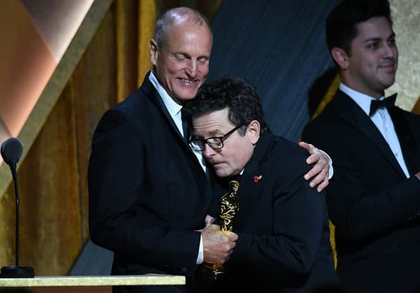 Woody Harrelson and Michael J. Fox at a gala night in Los Angeles on November 19, 2022.
