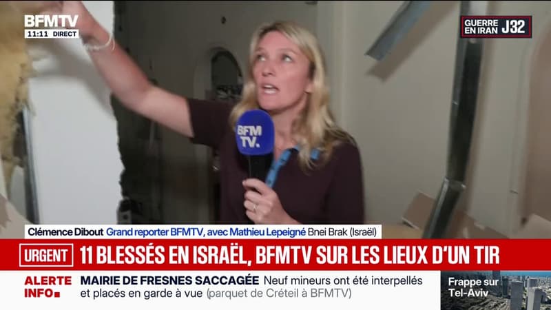 Guerre au Moyen-Orient: à l'intérieur d'un immeuble frappé par un tir à Bnei Brak (Israël)