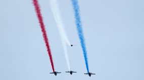 Les Alphajet de la Patrouille de France (PAF) survolent Paris lors d'une répétition, le 9 juillet 2024, avant le défilé annuel du 14 juillet