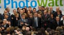 Nicolas Sarkozy s'adresse au personnel de PhotoWatt à Bourgoin-Jallieu, en Isère, où il était venu annoncer la reprise de l'entreprise par une filiale d'EDF avec le patron de l'électricien, Henri Proglio (à sa gauche). Le président a endossé à cette occas