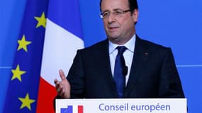 François Hollande a annoncé vendredi que le mécanisme unique européen de supervision bancaire serait en place au milieu de l'année prochaine. /Photo prise le 28 juin 2013/REUTERS/Yves Herman
