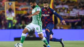 Gérard Piqué au duel avec Nabil Fekir