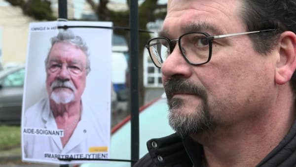 Dominique and his aged alter-ego, displayed on the gates of the Vierzon hospital 