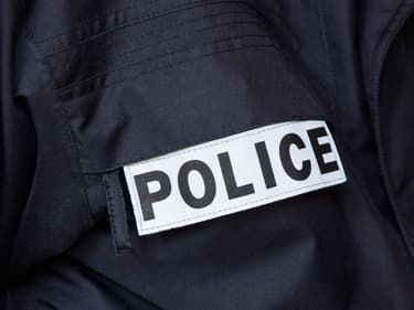 Un badge de la police sur une veste (illustration)