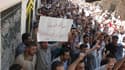 Manifestation contre Bachar al Assad à Houla, près de Homs. Les observateurs de l'Onu ont estimé samedi que le massacre commis à Tremsa, village de la province syrienne de Hama, visait l'opposition. /Photo prise le 13 juillet 2012/REUTERS/Shaam News Netwo