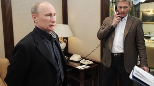 Le président Vladimir Poutine et le porte-parole du Kremlin Dmitri Peskov, le 4 mars 2012.