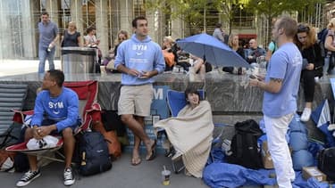 File d'attente devant l'Apple Store de New York à quelques heures de la mise en vente des nouveaux iPhone.