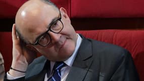 Faire de 2014 la dernière année d'augmentation des impôts dépendra de l'état de l'économie française et de la croissance, a déclaré dimanche le ministre de l'Economie Pierre Moscovici. /Photo prise le 20 juin 2013/REUTERS/Philippe Wojazer